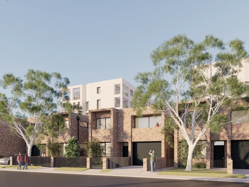 Street view of the new Derby Street homes, with established gum trees along the frontage